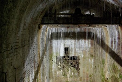 Friday 2 July, 2010  The bunker system was tunneled through limestone and water seeps easily through it. Sixty five years later there is a considerable buildup of stalactites. : 2010-07-02 Eagles nest