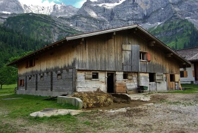 Friday 25  June, 2010  This building is typical of those in the village. The residence at the front faces SE and the barn is behind it.  The rotting combination of hay, cow pee and poo was on the nose a little. : 2010-06-25 Mittenvald