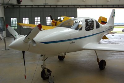 Wednesday 30  June, 2010 Lancair IV   The Lancair IV is a kit plane optimized to achieve long range and low fuel consumption.  In touring flight, its fuel consumption is 10 litres/100 or  equivalent to a medium-sized car but with twice the speed. Its range is 4800 km. Up until 2005, more than 2000 kits had been sold in 40 countries. : 2010-06-30 air museum