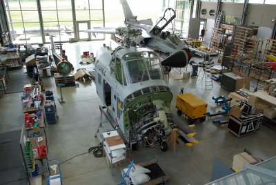 Wednesday 30  June, 2010 Sikorsky S-58 (H-34 G) and Panavia Tornado  In the restoration hangar, an S-58 helicopter and a Panavia Tornado are being restored. The Sikorsky S-58  is a midsized helicopter for civil and military use. It was one of the largest helicopters ever fitted with a piston engine. S-58s were stationed at the Schleissheim airfield with an Army flying unit from 1956 until 1969. : 2010-06-30 air museum