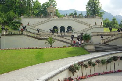 Thursday 1 July, 2010  At the Southern end of the water parterre, series of steps lead to the Terrace Gardens and from there to the Temple of Venus. In the middle arch on the landing above the fountain is the bust of Marie Antoinette of France. : 2010-07-01 partnach-lindenberg