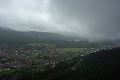 Sunday 20 June, 2010  As we rise, we enter the rain clouds. Very exciting. The German Army base is at the far right of the picture. : 2010-06-20 mittenwald