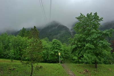 Sunday 20 June, 2010  We stand in the parking lot of the Karwendelbahn Valley Station, look back up and Karwendel is still covered in cloud. This was a fun experience. : 2010-06-20 mittenwald