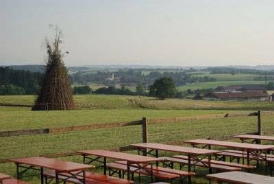 Saturday 3 July, 2010   Down beyond the seating area was an open area and then a roped-off area in which a huge bonfire stood waiting to be set alight. : 2010-07-03 Munchen-bonfire