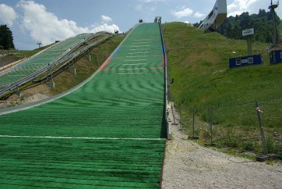 Thursday 1 July, 2010  This jump is called the Garmisch-Partenkirchen - Olympiaschanze. It has a hill size of 140 metres, (the lower of the two red lines) and a K Point of 125 metres (the upper red line). Flights that exceed the K Point have points added for every metre over the line and deducted for every metre short of the line. These "distance" points are added to the "style" points. : 2010-07-01 partnach-lindenberg