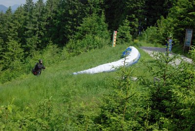 Wednesday 23  June, 2010  From the cable car we can see our would-be pilot still struggling with the wind. : 2006-06-23 Bavarian Alps