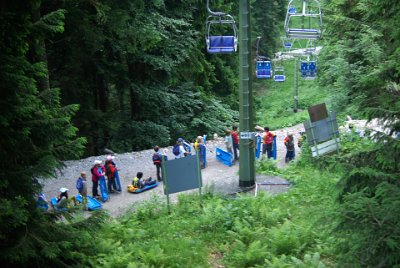 Wednesday 23  June, 2010  Kids line up to take a toboggan run back to base. I envy kids sometimes, this looks like such fun. : 2006-06-23 Bavarian Alps