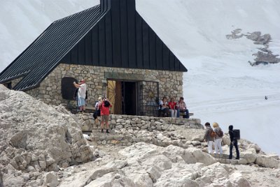 Monday 28  June, 2010  We walk up the hill a little to visit German's highest chapel. The boulders in front of us were formed by glacial action. : 2010-06-28 sugspitze