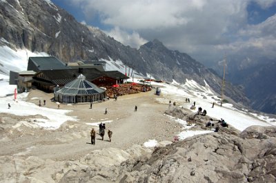 Monday 28  June, 2010  From the chapel, we look back down at the Zugspitplatt buildings. The round building is the entrance for the cogwheel railway. : 2010-06-28 sugspitze