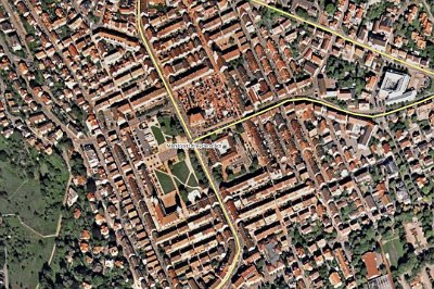 Sunday 4 July, 2010 35th wedding anniversary  Marktplatz is actually three separate areas: the market area, the area where the children were playing and the park to the left. This  aerial photograph makes  it appear that the square itself  enclosed by a fortress of rows of buildings.