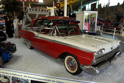 Wednesday 14 July, 2010 1959 Ford Skyliner Convertible   The "Skyliner" was a car that, despite luxury extras like power steering, power brakes and automatic transmission, remained affordable for the majority of Americans. The steel top could be folded away into the boot at the press of a button.  The Skyliner was powered by a 4.1 litre V8 and 58,147 were produced. : 2010-07-13 Claus