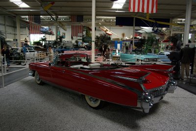 Wednesday 14 July, 2010 1959 Cadillac Eldorado Biarritz   The 1959 Cadillac Eldorado Biarritz was a huge car 5.9 metres long. A  6.4 litre V8 engine powered the car and it was equipped with all the extras then available; among them were air-conditioning, power steering, electric windows, automatic roof, electrically adjustable seats and headlight dimmers.  Total production was 1,320 units. : 2010-07-13 Claus