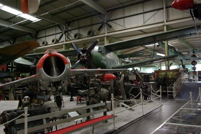 Wednesday 14 July, 2010  Aircraft display  An overview of this part of the museum shows the MiG 15,  the AH-22 and an assortment of engines, propellers and other bric-a-brac. : 2010-07-13 Claus