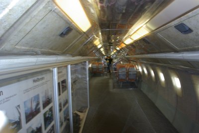 Wednesday 14 July, 2010  Tupolev TU-144 SST  Inside the airliner. Claus and Jenni walked to the cockpit but this is as far as I got. The steep angle represents the aircraft's takeoff angle. : 2010-07-13 Claus