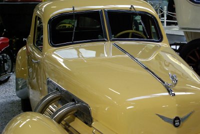 Wednesday 14 July, 2010  1937 Cord 812  Supercharging was made available on the 1937 812 model. Supercharged 812 models were distinguished from the normally aspirated 812s by brilliant chrome-plated external exhaust pipes mounted on each side of the hood. : 2010-07-13 Claus