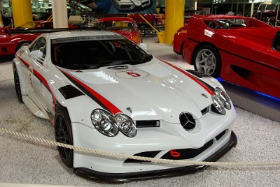 Wednesday 14 July, 2010  2003-2007 Mercedes Benz SLR McLaren  The Mercedes-Benz SLR (Sport, Light, Racing) McLaren is an Anglo-German supercar jointly developed by Mercedes-Benz and McLaren Automotive.  It was built in Portsmouth and the McLaren Technology Centre in Woking, Surrey, England. At the time Mercedes-Benz owned 40 percent of the McLaren Group.  The car's base price of  US$450,000 or €351,269  made it the ninth most expensive street legal car in the year 2008. : 2010-07-13 Claus