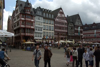 Saturday 12  June, 2010  Romerberg is the city hall square in the Altstadt (Old Town) area. The city council acquired nine houses in 1405 from  the Römer merchant family with the largest of them becoming the City Hall. These six houses on the east side of the  Römerberg were destroyed in World War II and reconstructed between 1981–1984. : 2010-06-13 Frankfurt