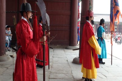 Thursday 10 June, 2010  The guards are dressed in traditional costumes and are armed with traditional weapons - the two guards at the rear carry bows and arrows. : JGR Korea