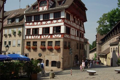 Monday 12 July, 2010 &nbsp;  The Albrecht Duerer House was built in 1420 and it was acquired by    Albrecht Duerer     in 1509. He lived and worked here until his death. The house was severely damaged in WWII but was rebuilt in 1951.  The building now serves as the Duerer Museum displaying examples  of Duerer's work. : 2010-07-12 Nurnberg