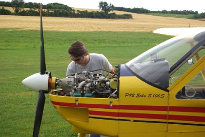 Tuesday 13 July, 2010 &nbsp;  Lukas also carries out a careful preflight check; here he checks the Rotax 912 ULS engine. This is a similar engine to the Scheibe's but not as highly rated and cheaper. : 2010-07-13 Neurnberg