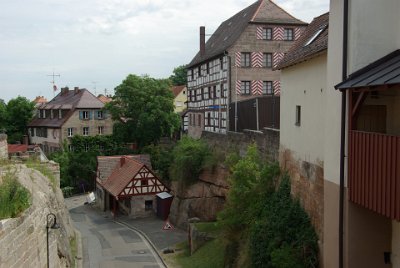 Tuesday 13 July, 2010 &nbsp;  The wall of the castle separates it from the rest of the village. : 2010-07-13 Neurnberg