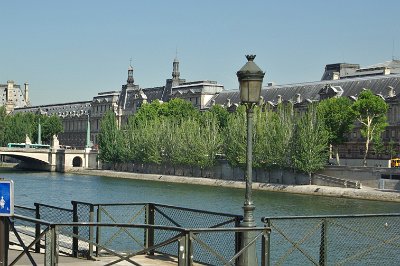 Thursday 8 July, 2010 &nbsp;  The pedestrian bridge, the Pont des Arts,  with the Louvre in the background. The famous pyramid is in the courtyard behind. : 2010-07-08 Paris1