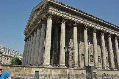 Thursday 8 July, 2010 &nbsp;  This is the L'église de la Madeleine ( Madeleine Church) a Roman Catholic church.  It was designed in 1806 as a temple to the glory of Napoleon's army and Napoleon himself. After the fall of Napoleon in 1814,    King Louis XVIII    determined that the structure would be used as a church, dedicated to Mary Magdalene. : 2010-07-08 Paris1