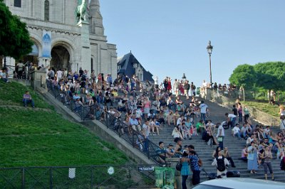 Thursday 8 July, 2010 &nbsp;  The steps to the Sacré-Cœur were crowded with people. A singer, visible halfway up the steps, entertained the masses. : 2010-07-08 Paris1