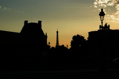 Thursday 8 July, 2010 &nbsp;  The Eiffel Tower and the    Arc de Triomphe du Carrousel    silhouetted against the setting sun. : 2010-07-08 Paris1