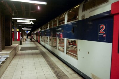 Thursday 8 July, 2010 &nbsp;  Opposite the Musee d'Orsay is an RER  station (Réseau Express Régional, "Regional Express Network"). The RER is a rapid transit system that serves Paris and its suburbs. Sadly, the trains were heavily disfigured with graffiti. We caught this train to the Eiffel Tower RER station. : 2010-07-08 Paris1