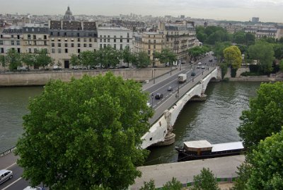 Friday 9 July, 2010 &nbsp;  Directly in front of us is the southern part of the Pont de Sully. The bridge was constructed in 1876 as part of Haussmann's renovation of Paris.  The Île Saint-Louis is in front of us; the second of the two islands in the Seine. : 2010-07-09 Paris2