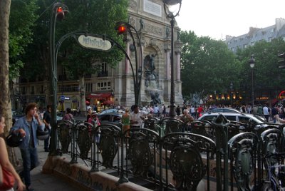 Friday 9 July, 2010 &nbsp;  Place St Michel is very, very crowded and very, very hot. We catch the Metro from Michel station and return to our hotel. I would like to spend a day wandering through the Latin Quarter in more normal circumstances. : 2010-07-09 Paris2