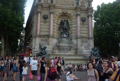 Friday 9 July, 2010 &nbsp;  A statue of Saint Michael the Archangel sits atop the fountain in the Place Saint-Michel. Two dragons spout water into the fountain and figures of the four classical cardinal virtues adorn the top of the structure. In Christian traditions there are 4 cardinal virtues:  • Prudence - able to judge between actions with regard to appropriate actions at a given time •  Justice - proper moderation between self-interest and the rights and needs of others  • Restraint or Temperance - practicing self-control, abstention, and moderation  • Courage or Fortitude - forbearance, endurance, and ability to confront fear and uncertainty, or intimidation. : 2010-07-09 Paris2