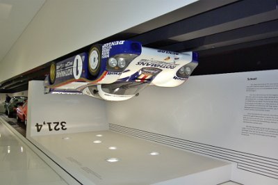 Thursday 17  June, 2010 1987 Porsche 962 C Le Mans  Between 1982 & 1994 Porsche 956/962 cars won Le Man seven times. This exhibit demonstrates that the aerodynamic force generated by the wings and body shape is so great that at top speed it could theoretically be driven on the roof. : 2010-06-18 stuttgart