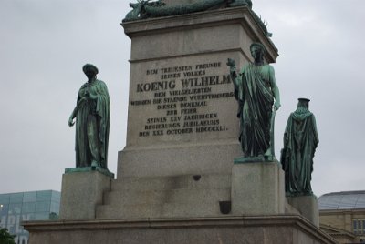 Friday 18,  June, 2010  The brazen (brass) statues are of of the four     estates of the realm    that were broad social orders recognized in the Middle Ages and Early Modern period in Christian Europe: the clergy, the nobility, and commoners with the King at the top of the three. Below the pedestal are four reliefs, three of which glorify the king's military successes against Napoleon Bonaparte. : 2010-06-18 stuttgart