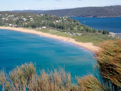 The boathouse where we had lunch yesterday is on the RH edge of the picture. Some hardy souls are on the beach. : anniversary no 36