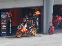 Friday 19 October 2012  We get to the track in time for MotoGP morning free practice FP1. We walk past the garages on the main straight and spot Marc Marquez' bike : MotoGPMalaysiq