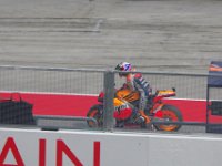 Friday 19 October 2012  Casey Stoner heads for the track. He isn't feeling too well having broken his foot at Indianapolis in August : MotoGPMalaysiq