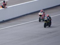 Friday 19 October 2012  Andea Dovizioso does a practice start with Stefan Bradl, Germany (6).  Stefan rides an LCR Honda RC211V satellite bike.  Satellite bikes are not quite the same as factory team bikes as they are usually a little behind with modifications during the racing season. : MotoGPMalaysiq