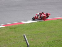 Friday 19 October 2012  Moto2 is characterised by extreme lean angles and hanging off the bike so far that the riders' elbows scrape the ground (with titanium elbow sliders).  This is Ricky Cardus (88) Spain, AJR chassis built in Spain : MotoGPMalaysiq