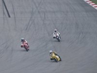 Saturday 20 October 2012  When we take our seats, Moto3 Free Practice is just finishing. Local Malaysian rider Fahmi Khairuddin  (63) gets a lot of support.  That's his picture at the entrance to the Sepang International raceway. : MotoGPMalaysiq