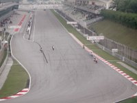 Saturday 20 October 2012  The straight is 1 km long with the main grandstand on the right and the garages on the left. Fahmi Khairuddin approaches turn 1 at 222 kmh.  His best lap time is 2'15, about 15 seconds slower than the MotoGP bikes. : MotoGPMalaysiq