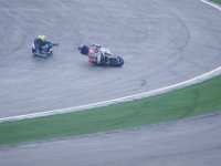 Saturday 20 October 2012  Axel Pons (49) slides off at turn 1. : MotoGPMalaysiq