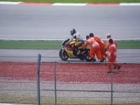 Saturday 20 October 2012  The  marshalls help him restart his engine and he rejoins QP. : MotoGPMalaysiq