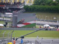 Saturday 20 October 2012  The chequered flag is out and most riders are still on their last lap. No one expects Barbera to do this well, 7th. Bradl bumps Hayden out of eight which means he and Rossi go down one more spot. : MotoGPMalaysiq