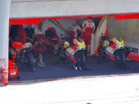 Sunday 21 October 2012   Sunday race day. We park ourselves under the giant TV which happily is on top of the Ducati factory team garage. : MotoGPMalaysiq