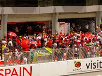 Sunday 21 October 2012   . . . and gather in front of Rossi's garage. Even when he is losing, he's still the most popular rider in the paddock. : MotoGPMalaysiq