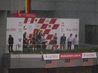 Sunday 21 October 2012  The Moto3 riders accept their trophies in the downpour. : MotoGPMalaysiq