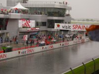 Sunday 21 October 2012   Moto2 gets under way after a half-hour delay  but the rain is relentless. After 16 of 19 laps the red flag waves (visible near the red lights) to stop the race. : MotoGPMalaysiq