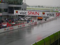 Sunday 21 October 2012   The flag marshall waves the red flag to stop the race during lap 14 of 20.  The rain worsened and caused many crashes including  Stefan Bradl, Cal Crutchlow, Randy de Puniet, Ivan Silva, Colin Edwards and serious injury to Ben Spies. : MotoGPMalaysiq